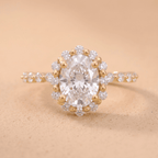 Shared prong halo promise ring in gold