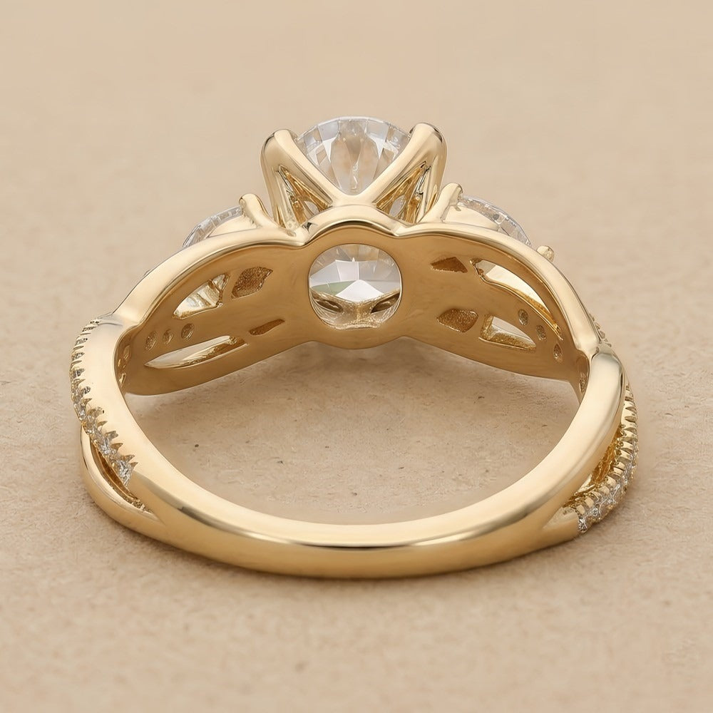 Delicate oval diamond ring with nature inspired design
