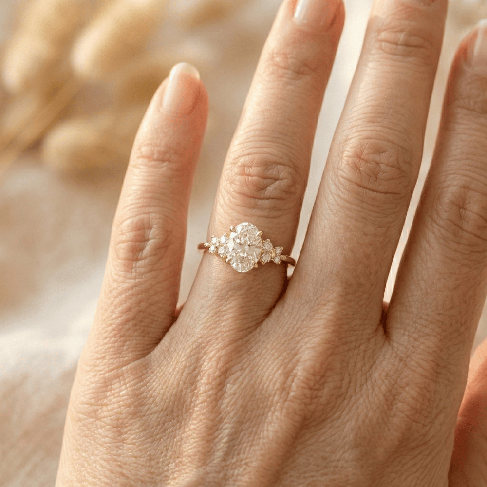 Oval cluster diamond ring crafted in 10KT yellow gold