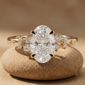 Oval lab grown diamond cluster engagement ring in 10KT gold