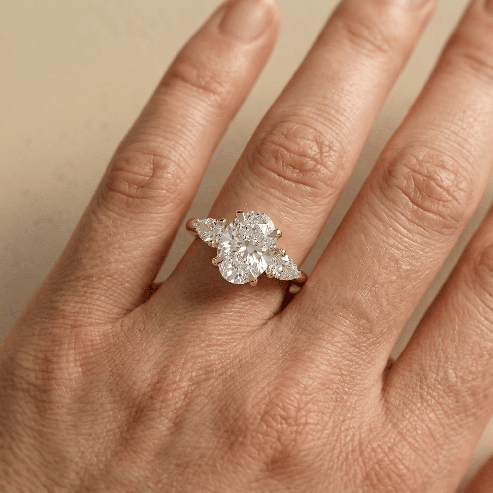 Lab grown oval diamond ring with elevated cathedral setting