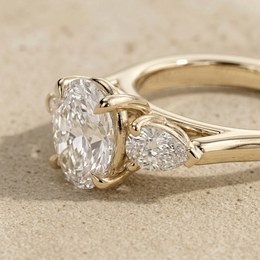 Oval diamond cathedral engagement ring side view
