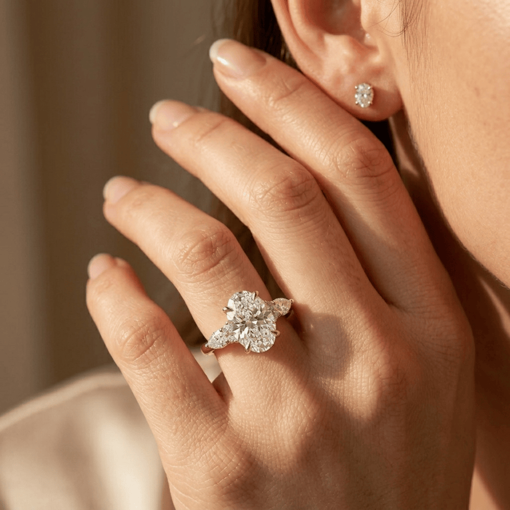 Oval lab diamond solitaire style three stone ring