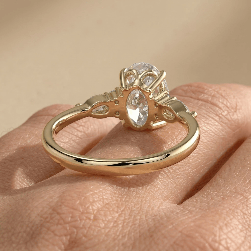 Oval lab diamond ring with elegant three stone setting