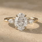 Three stone oval diamond ring in gold