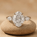 Oval lab grown diamond three stone gold engagement ring