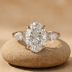 Oval lab grown diamond three stone gold engagement ring