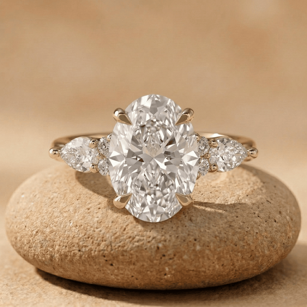 Oval lab grown diamond three stone gold engagement ring