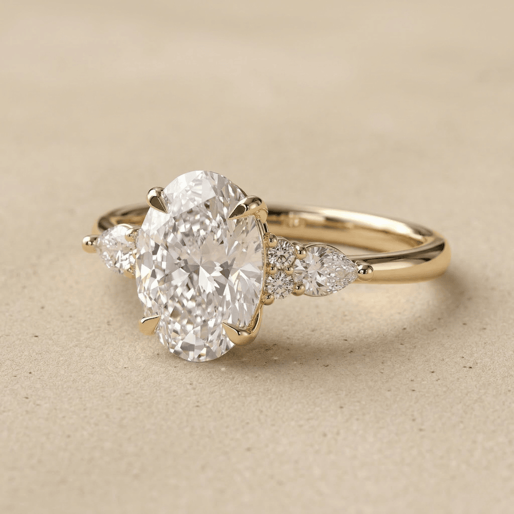 Oval lab diamond engagement ring with side stones