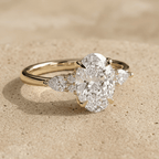 Oval lab diamond engagement ring with side stones