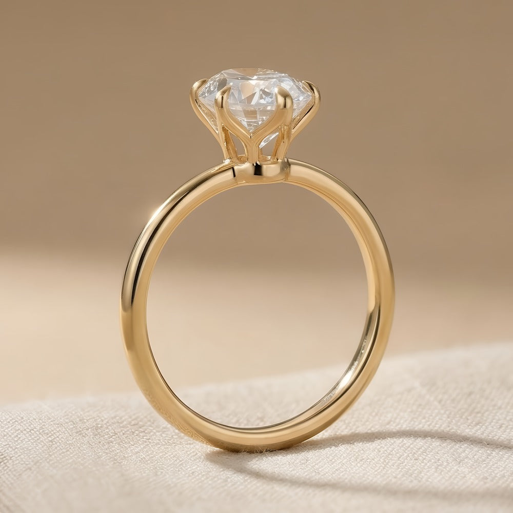 Dainty oval diamond wedding ring side view