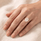 Oval diamond wedding band worn on hand