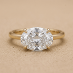 Oval lab grown East West wedding ring in 14k gold