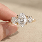 Oval diamond promise ring in gold