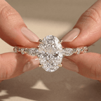 Oval cut lab diamond engagement ring with side diamonds