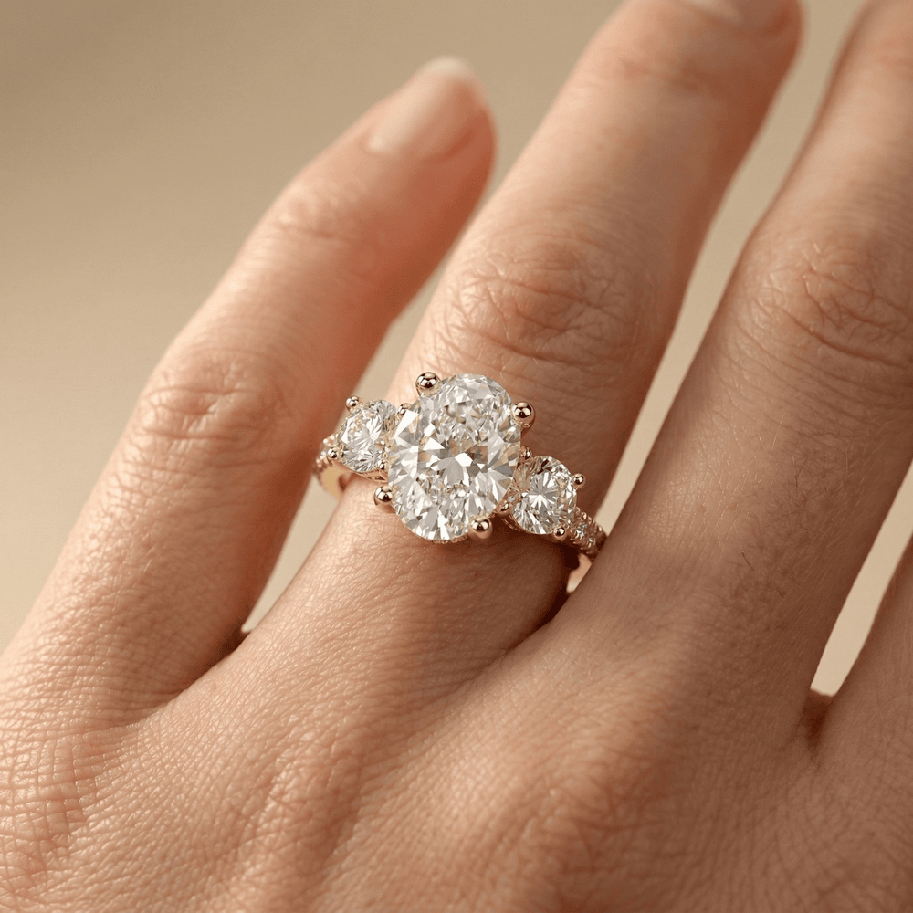 Oval lab grown diamond bridal ring with pavé shoulders