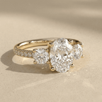 Three stone oval lab grown diamond ring with pavé setting
