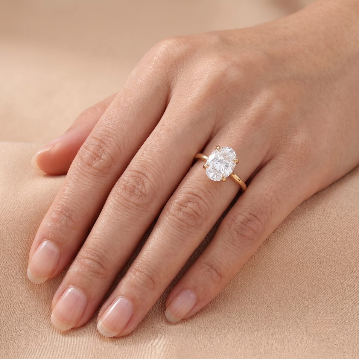Lab-grown moissanite oval ring on model hand
