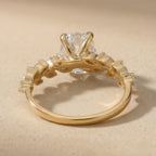 Oval moissanite ring with flower inspired design