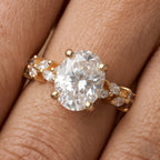 Close up of oval moissanite floral ring setting