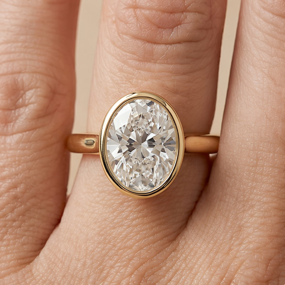 14K bezel set oval solitaire ring band detail