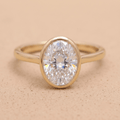 Oval moissanite diamond solitaire ring in 14K gold