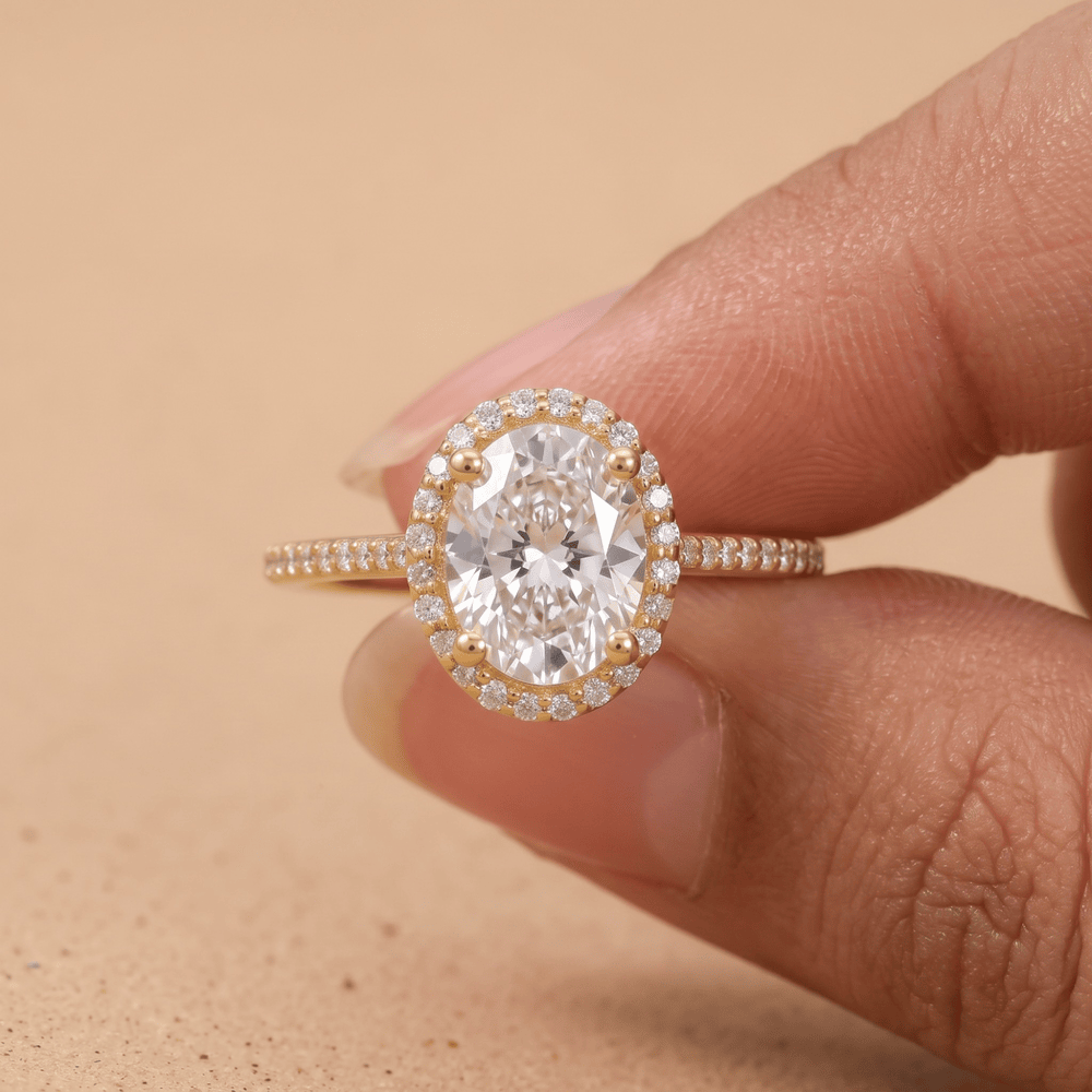 Oval moissanite halo ring in 14K gold