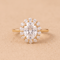 Oval moissanite lotus halo engagement ring front view