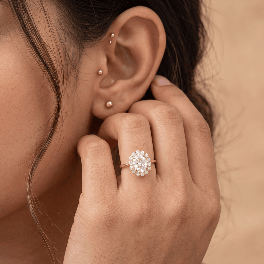 Oval moissanite halo ring couples jewelry lifestyle shot