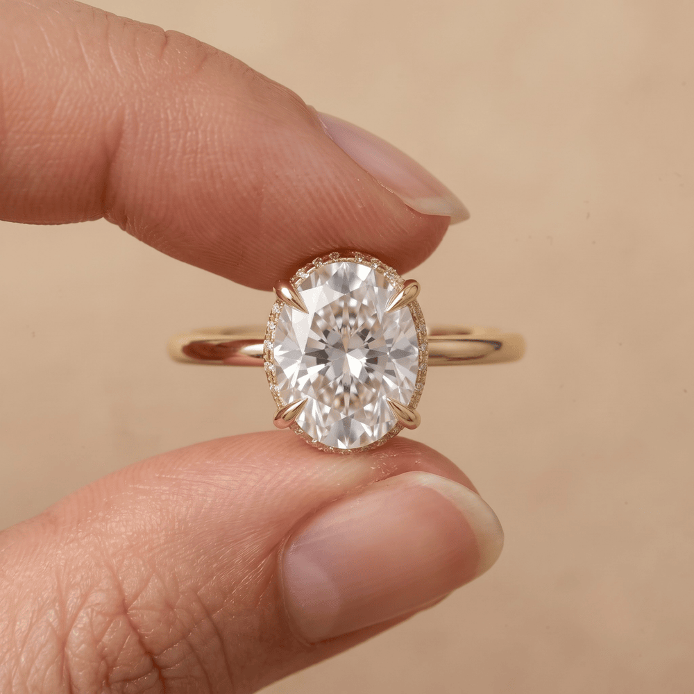 14K gold oval hidden halo ring profile shot