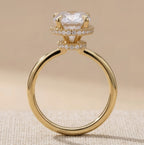 Oval moissanite proposal ring gold band side angle