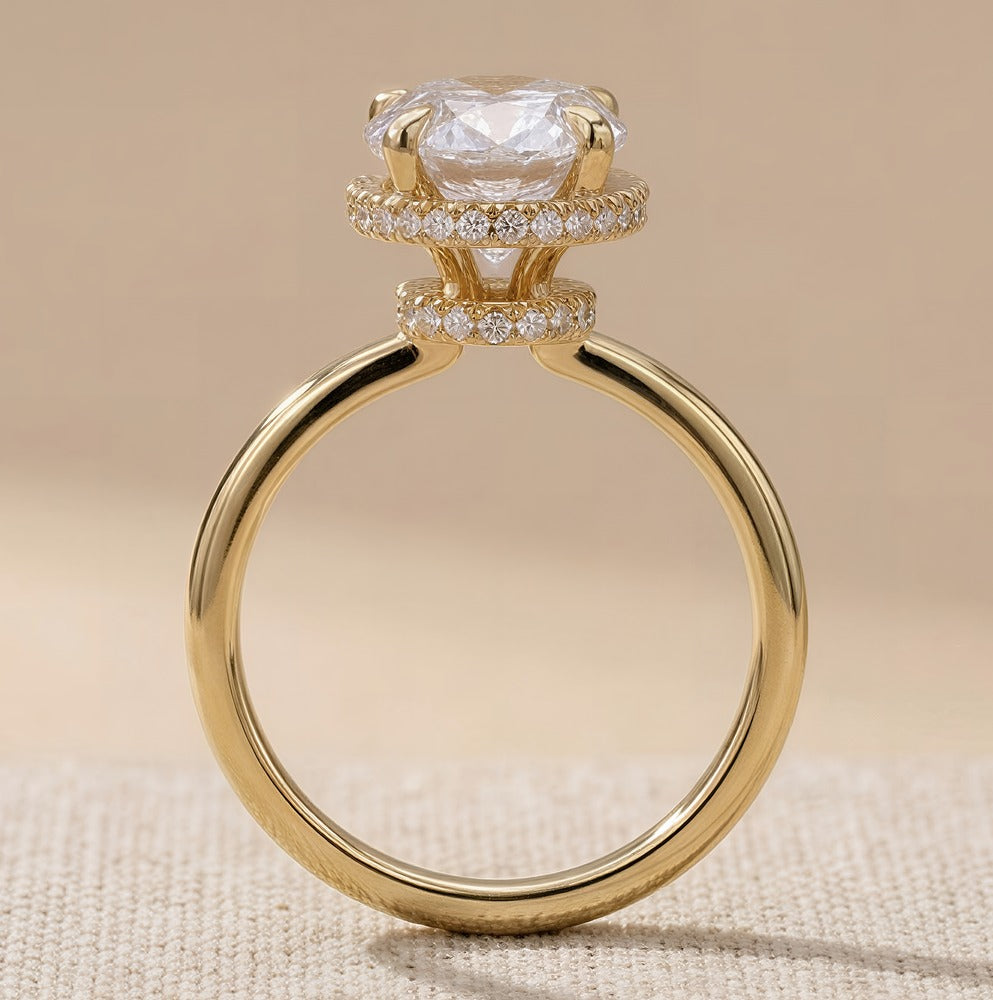 Oval moissanite proposal ring gold band side angle