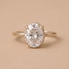 14K gold oval hidden halo moissanite ring front view