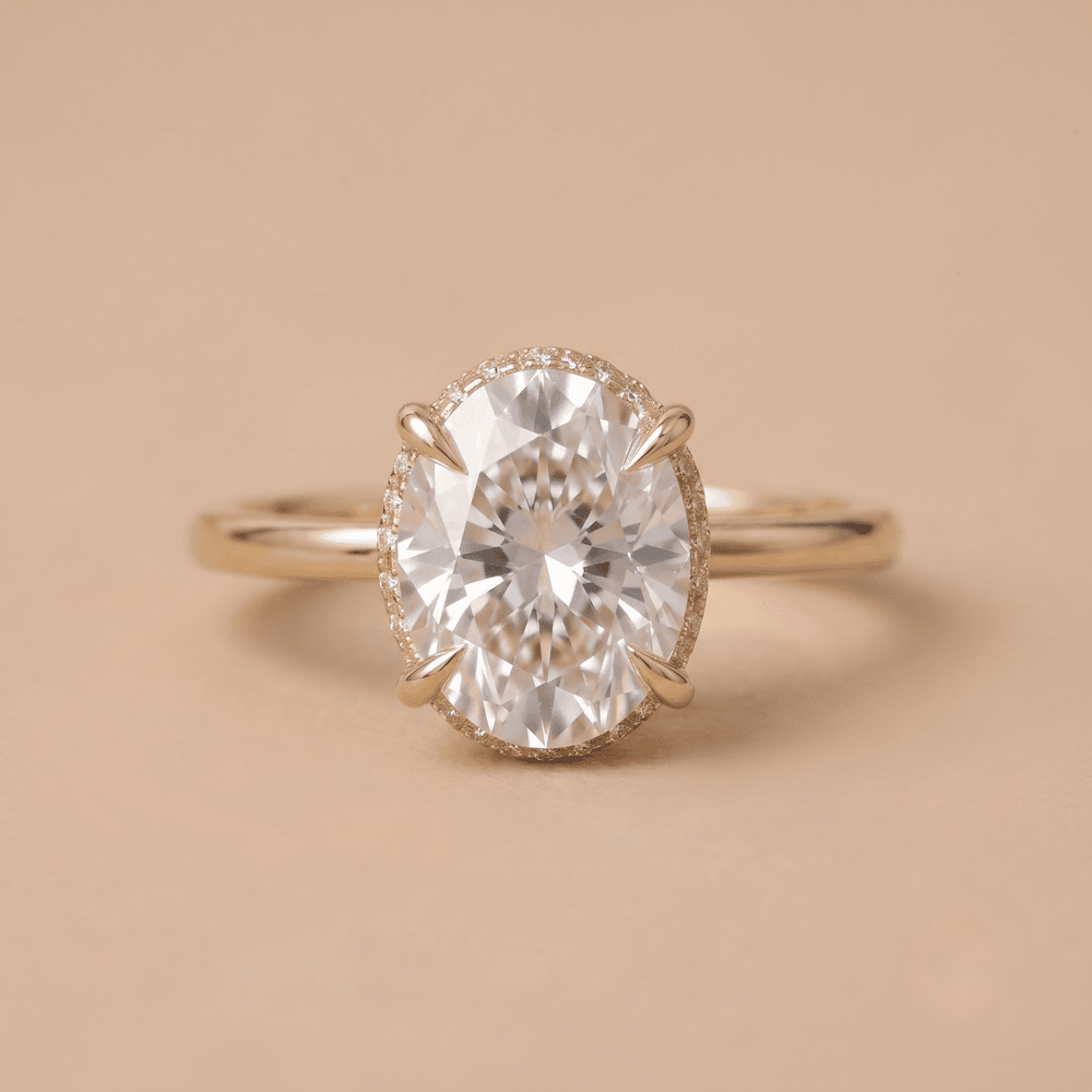 14K gold oval hidden halo moissanite ring front view