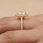Brilliant oval moissanite sunburst halo sparkle