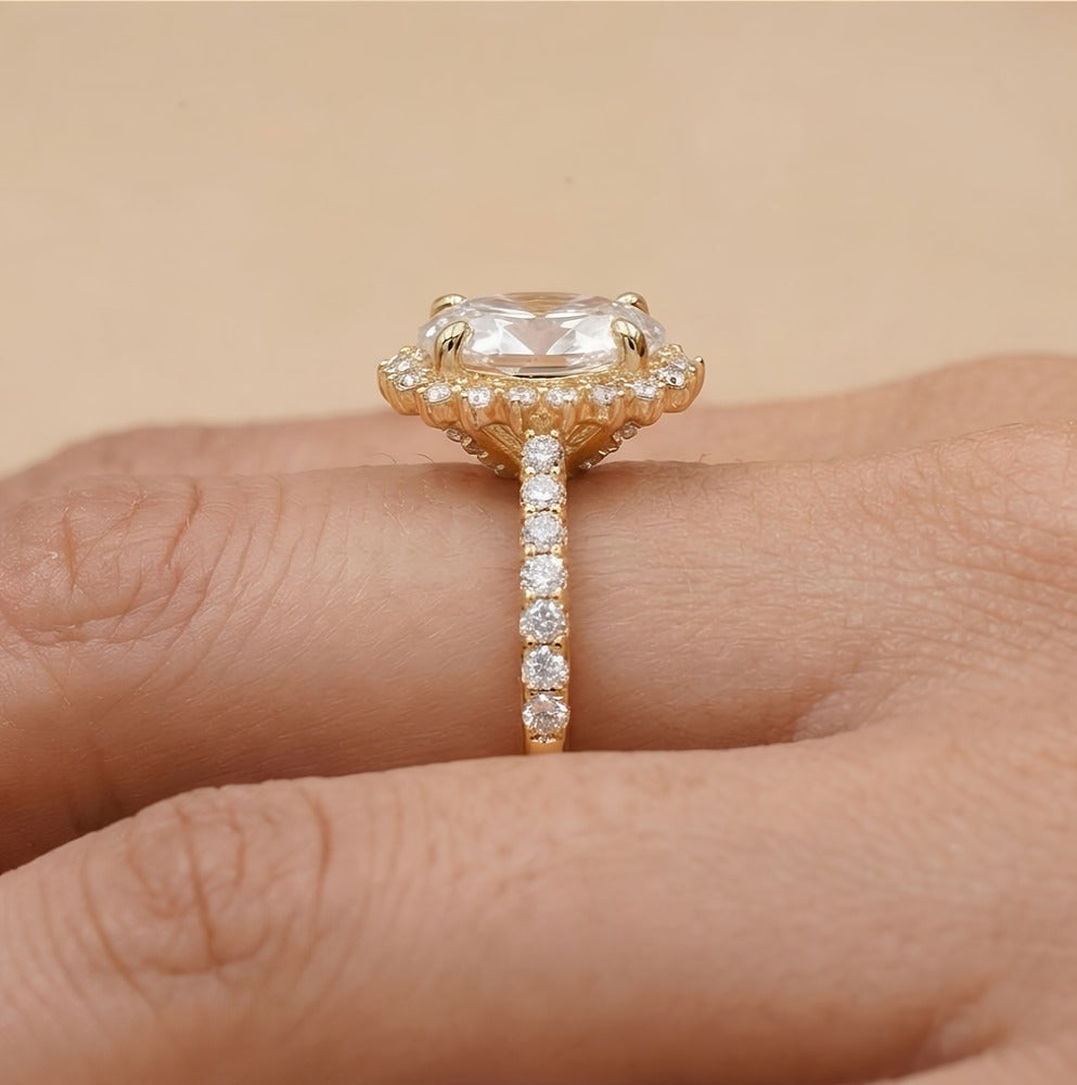 Brilliant oval moissanite sunburst halo sparkle