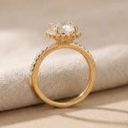 Moissanite oval center stone sunburst halo detail