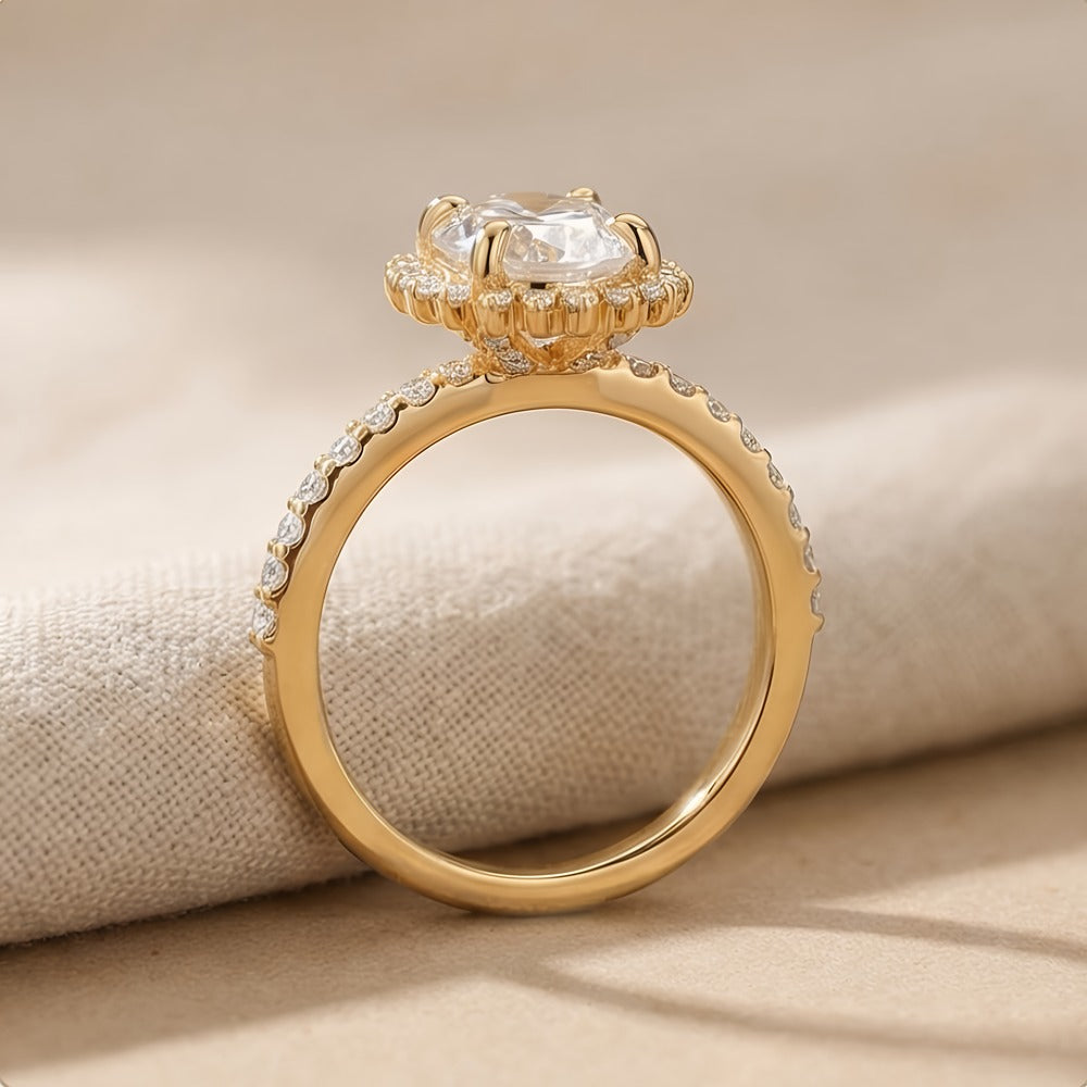 Moissanite oval center stone sunburst halo detail