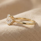 Solitaire oval moissanite ring side profile
