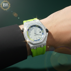 Luxury watch with green strap on a wrist, brand 'JBR' visible