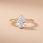 Pear cathedral anniversary ring in yellow gold