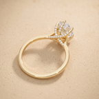 Conflict-free pear moissanite ring side profile view
