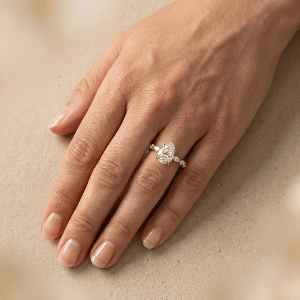 14K gold pear shaped diamond engagement ring for her