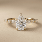 Pear shaped lab grown diamond engagement ring in 14K gold