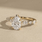 Luxury pear cut lab diamond wedding ring with side diamonds