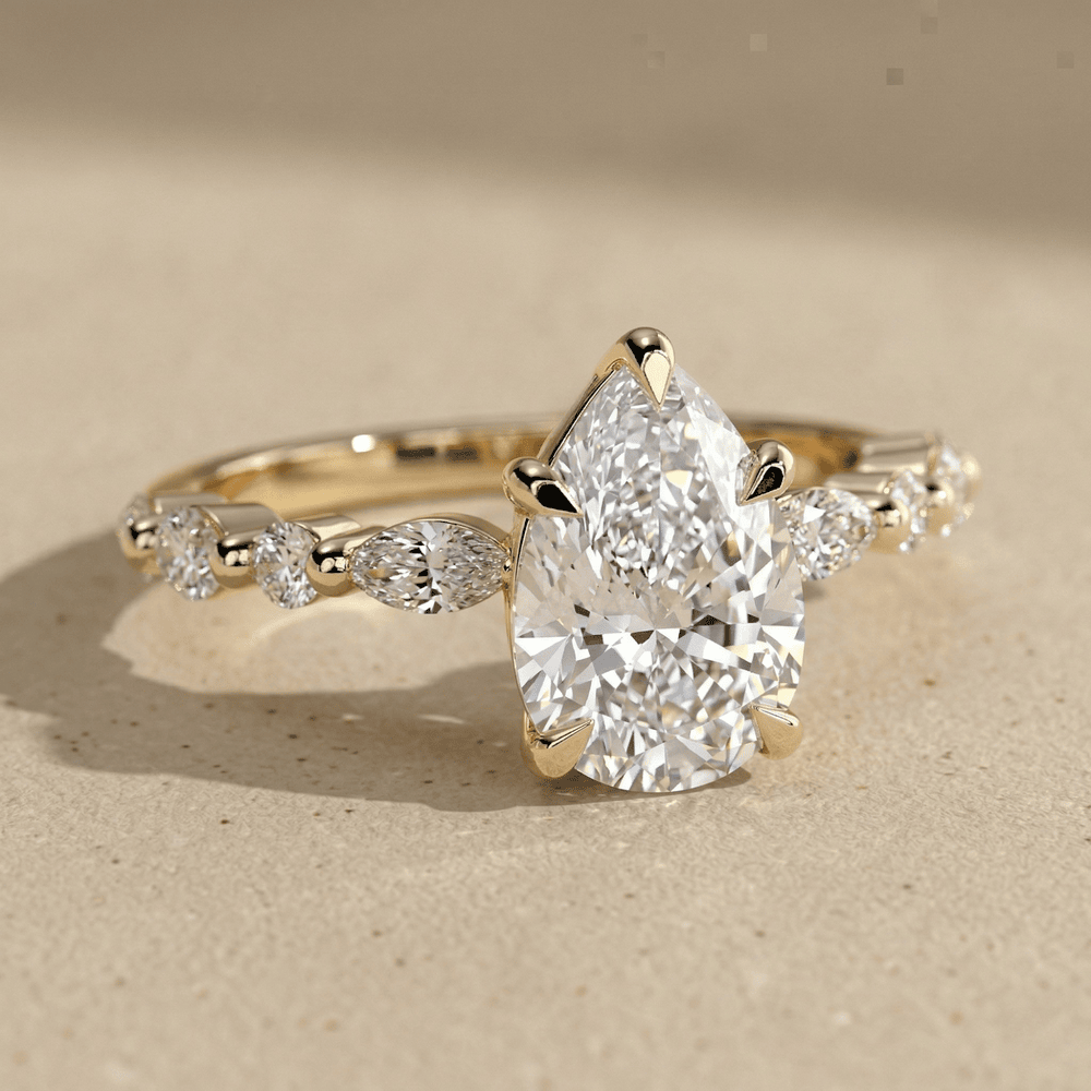 Luxury pear cut lab diamond wedding ring with side diamonds