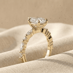14K gold pear diamond bridal ring with sparkling side stones