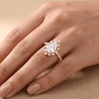 Pear cut diamond ring top view shared prong