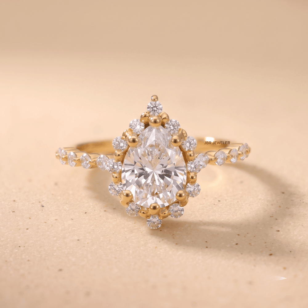 Lab grown diamond pear ring shared prong style