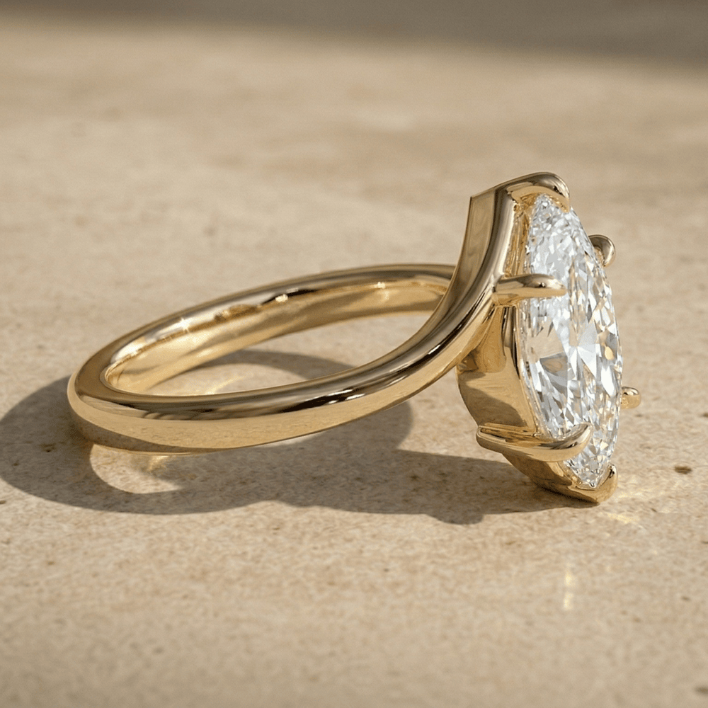 Yellow gold pear solitaire engagement ring for marriage proposal